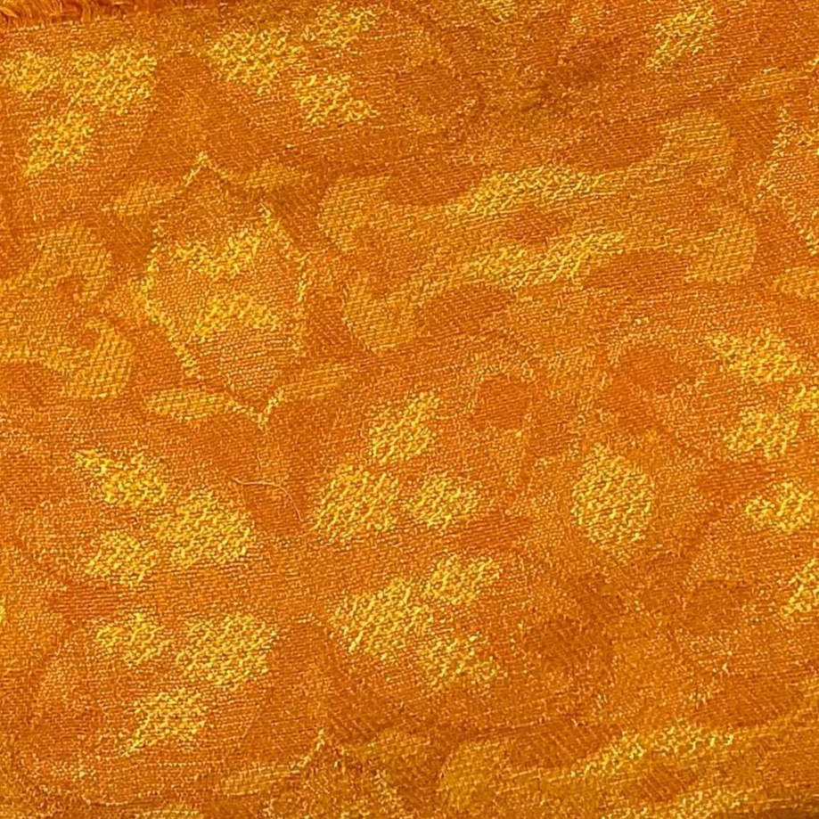 orange brocade fabric from Egypt Air Seats