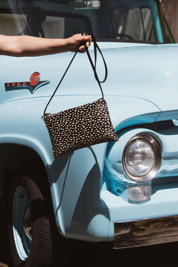 Bossa Nova Medium Crossbody Bag from Limited Edition Fabric made in USA#color_black-white-cowhide