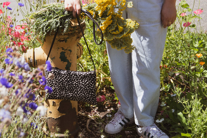 Bossa Nova Medium Crossbody Bag from Limited Edition Fabric made in USA#color_black-white-cowhide
