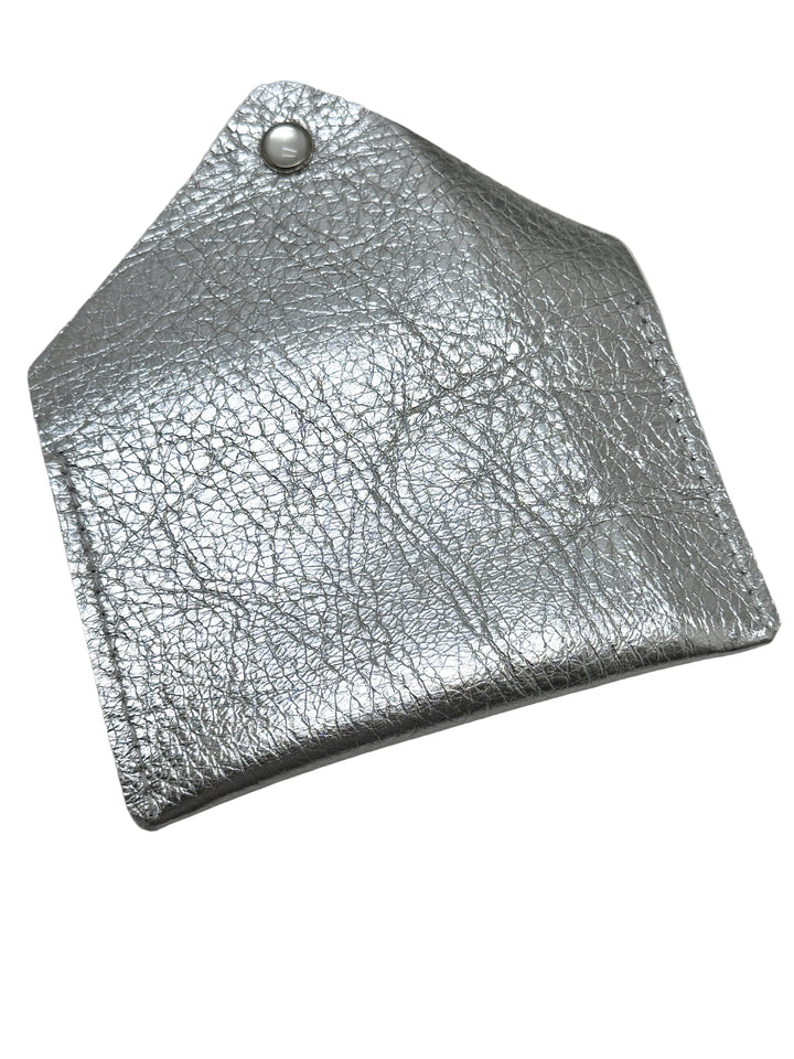 Silver metallic clutch on a gray background #color_silver