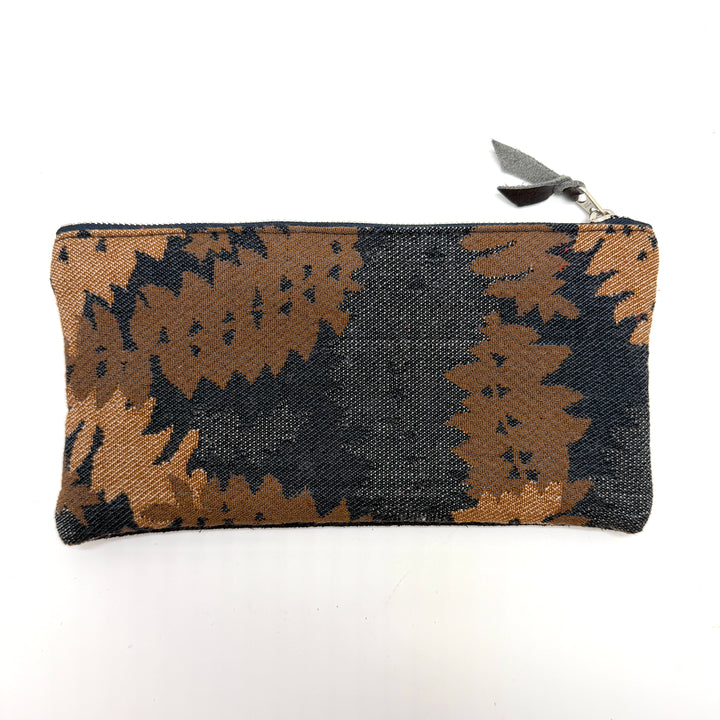 Patterned pouch with a zipper on a white background#color_midnight-ferns