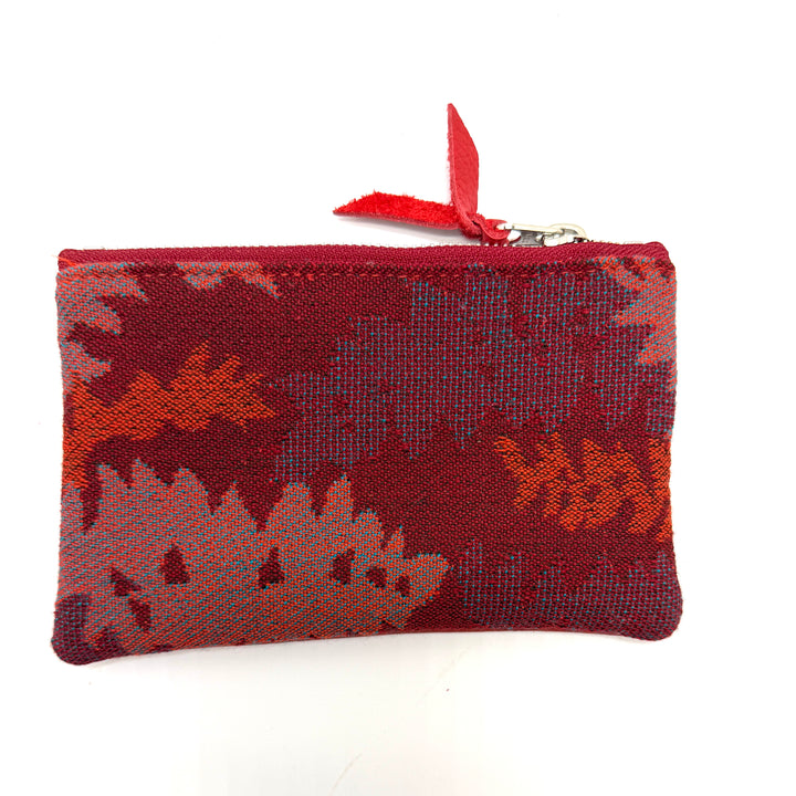 Red patterned pouch with a zipper on a white background#color_red-ferns