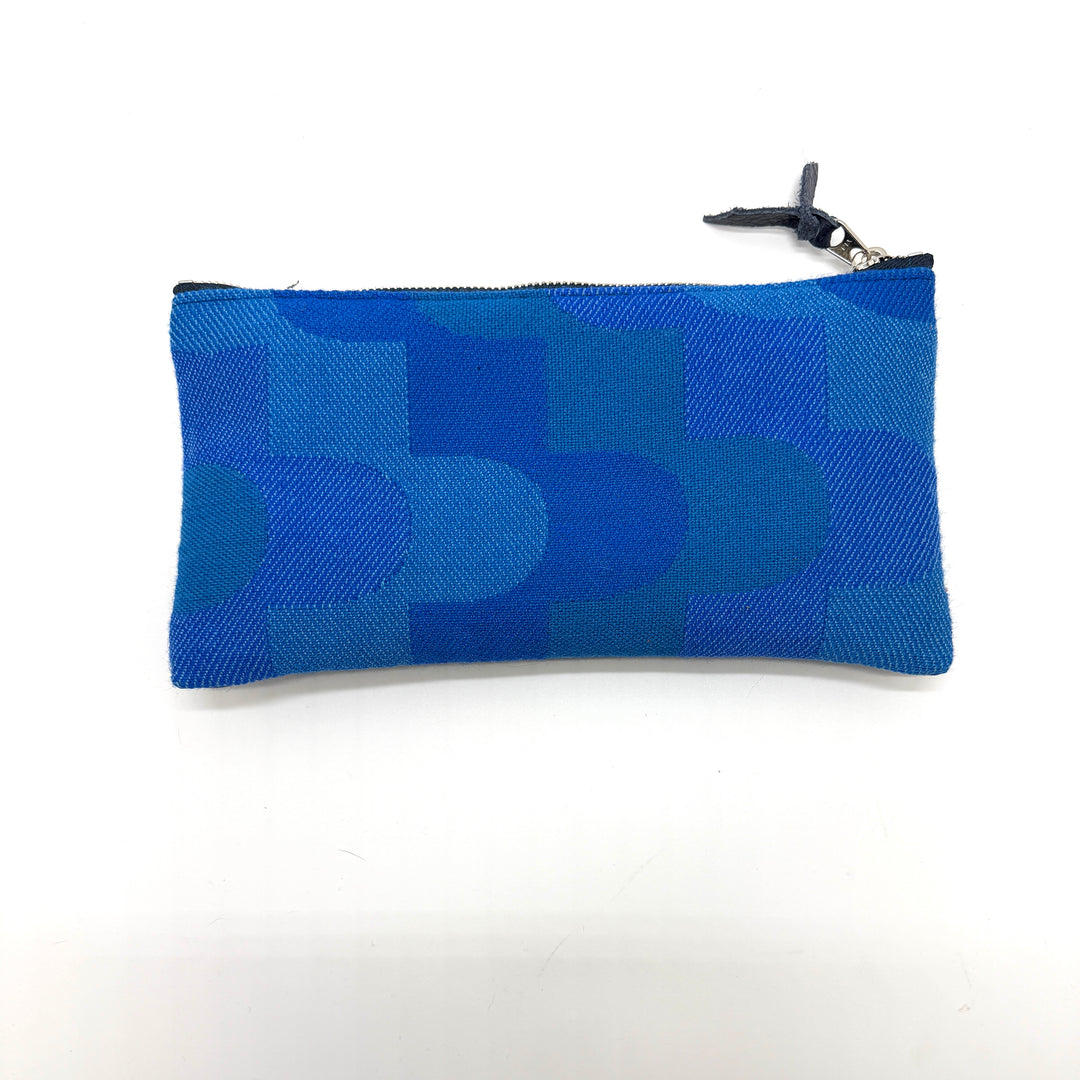 Blue patterned pouch with a zipper on a white background#color_sky-arches-blue