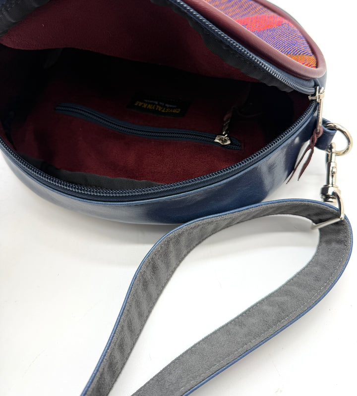 Blue handbag with a gray strap on a white background#color_navy-clouds-airplane-fabric