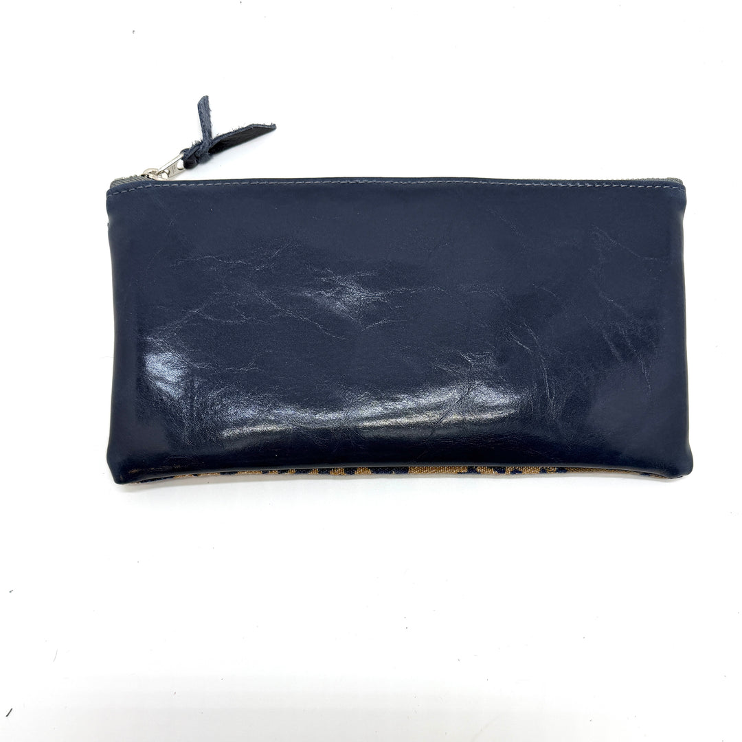 Navy blue leather pouch with a zipper on a white background#color_blue-ferns