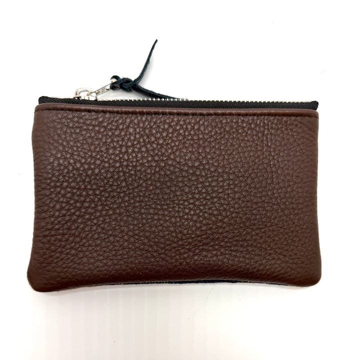 Brown leather pouch with a zipper on a white background