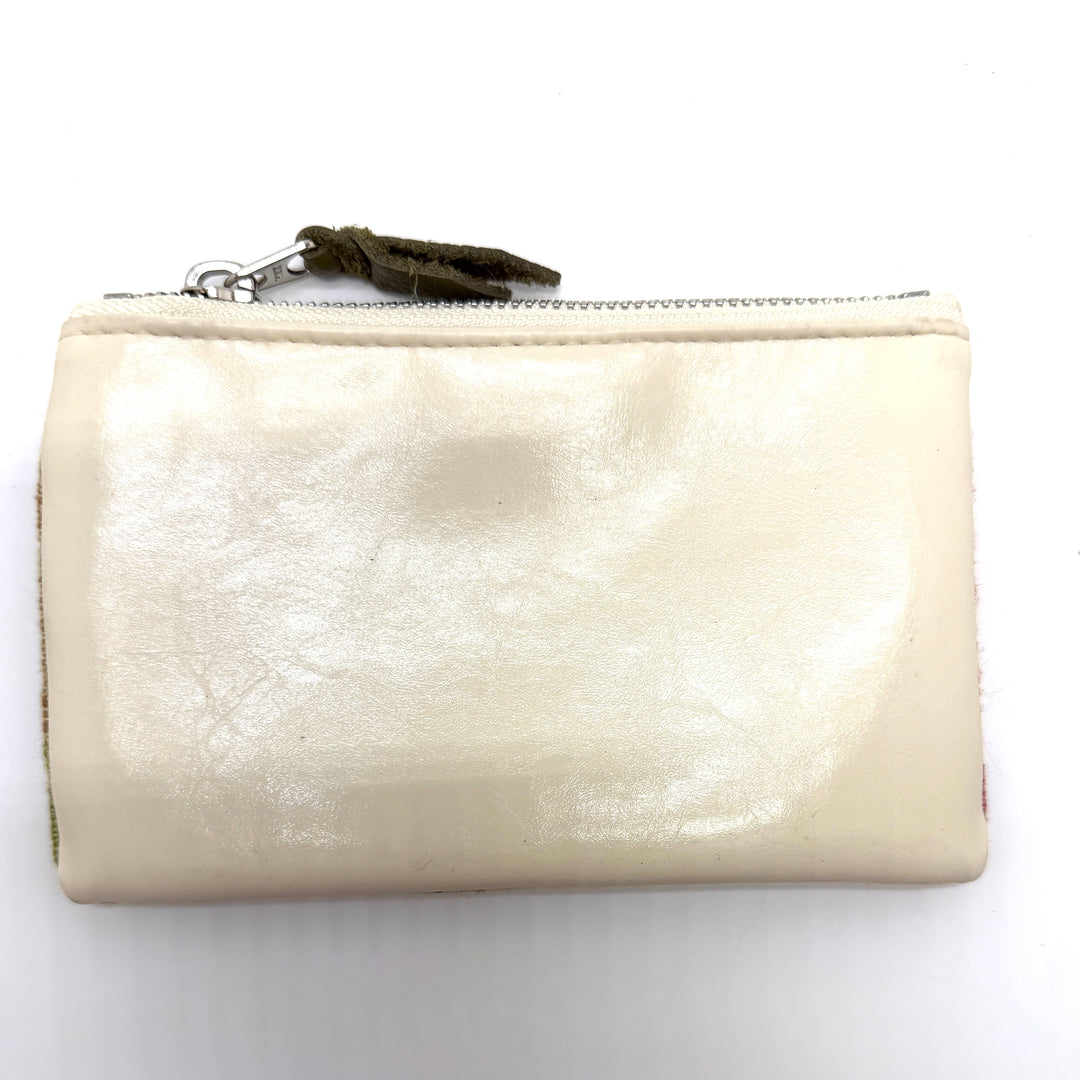 Beige wallet with a zipper on a white background