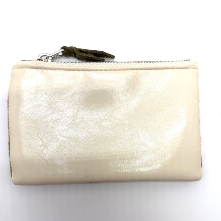 Beige wallet with a zipper on a white background