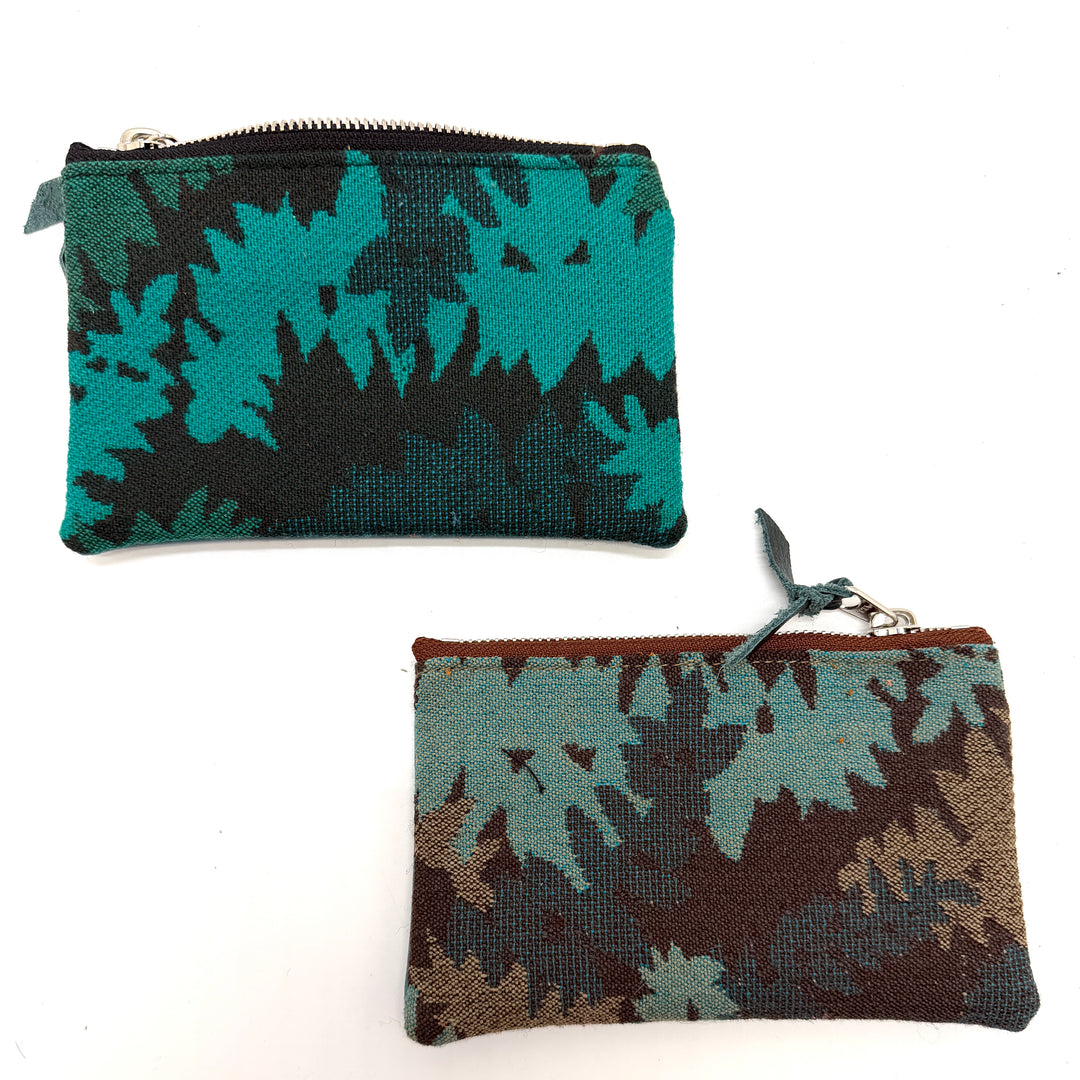 Two patterned pouches on a white background#color_teal-ferns