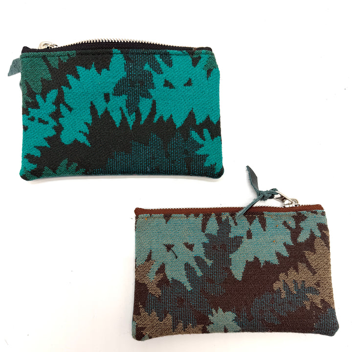 Two patterned pouches on a white background#color_teal-ferns