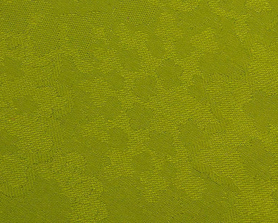 Green round bag with brown strap, passport, wallet, and keys on a light wooden surface