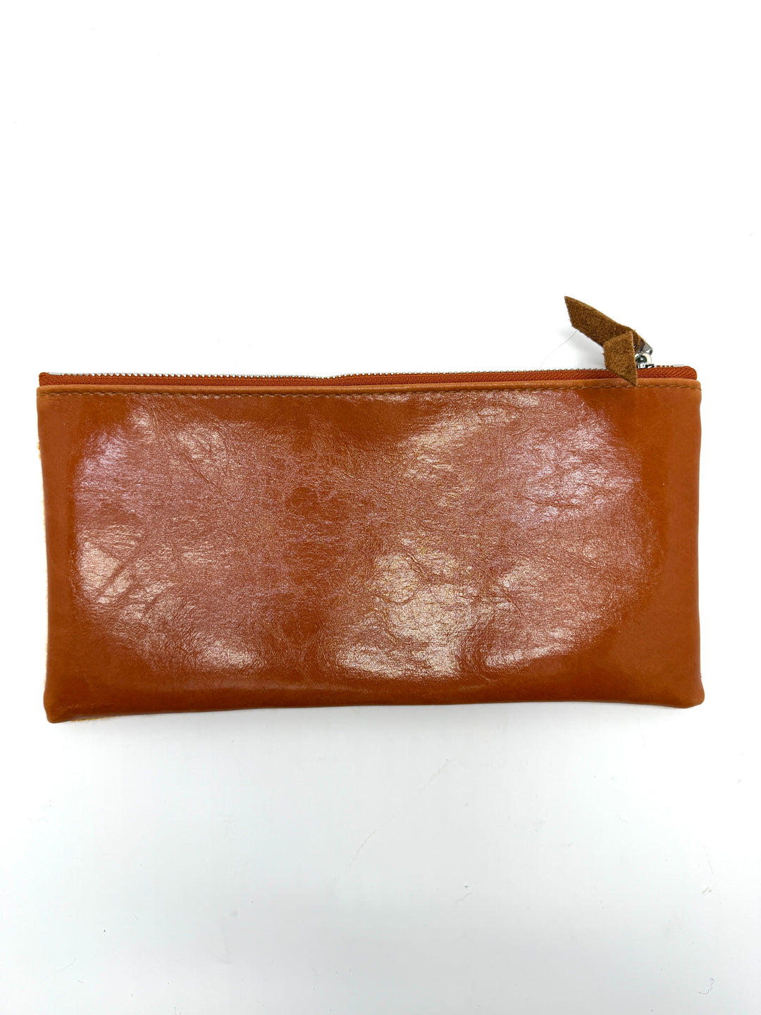 Brown leather pouch with a zipper on a white background#color_clouds-warm