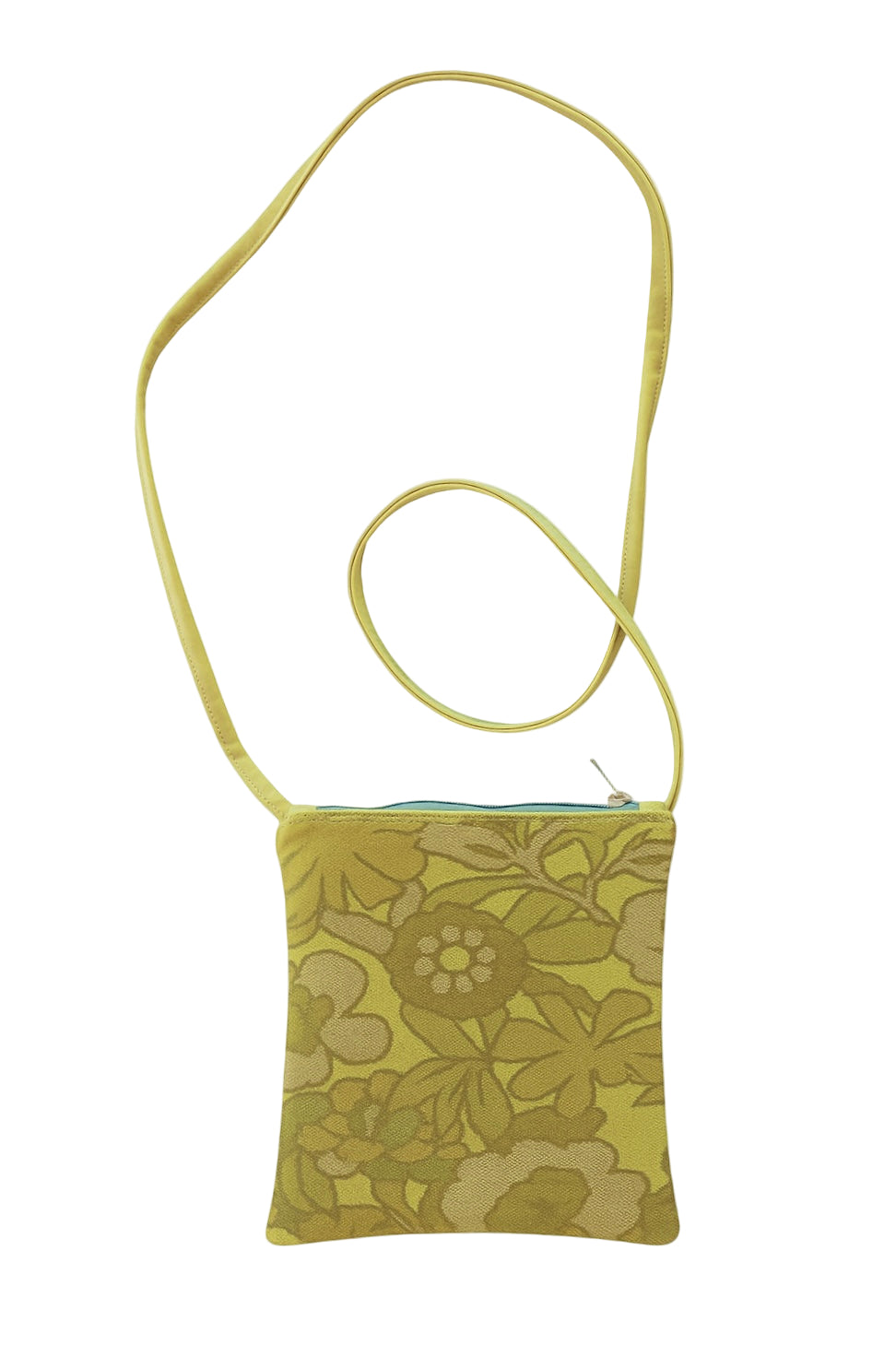 Green floral-patterned crossbody bag on a white background#color_lime-green-bloom