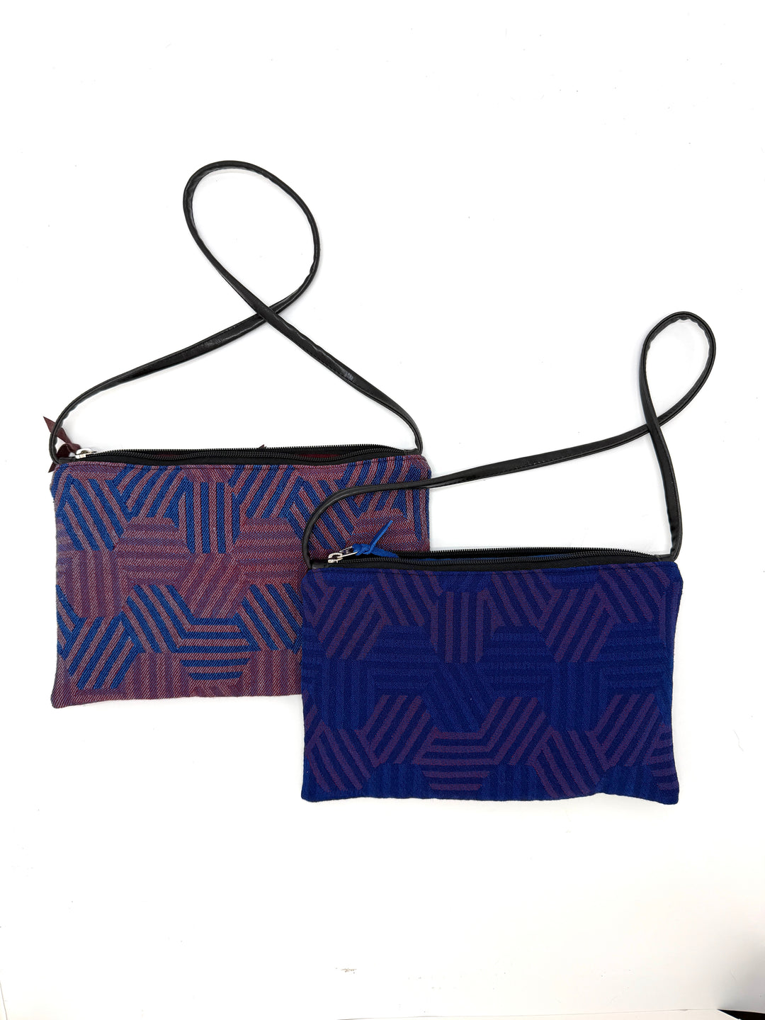 Two hexagon patterned pouches from vintage airplane fabric against a white background#color_hexagon-cool