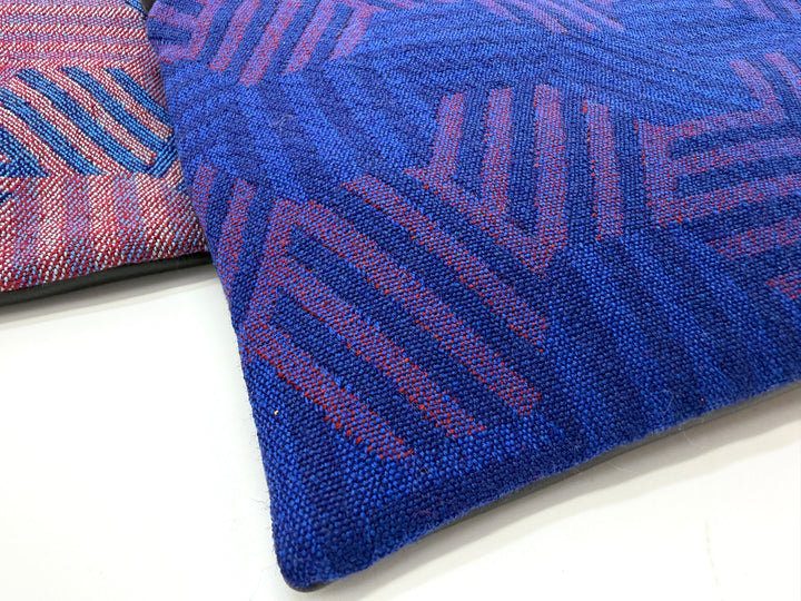 close up of Two hexagon patterned crossbody purses from vintage airplane fabric against a white background#color_hexagon-cool