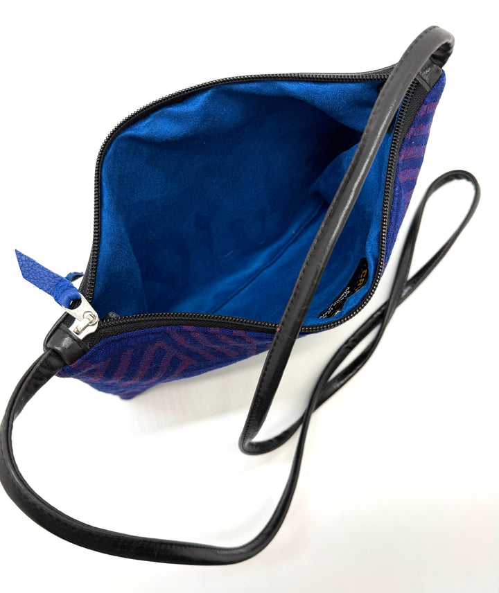 Blue bag with a black strap on a white background#color_hoxagon-cool