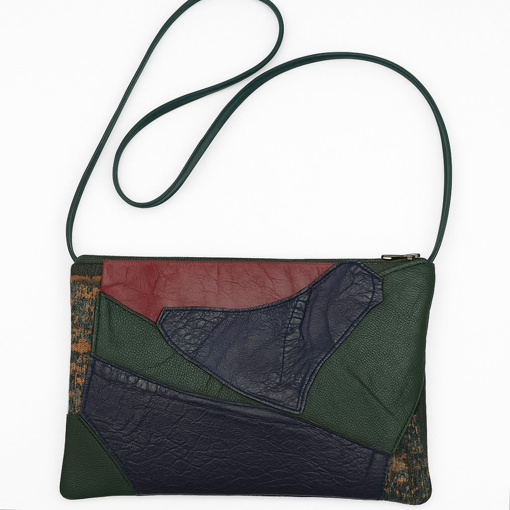 Multicolored leather patchwork crossbody bag on a white background