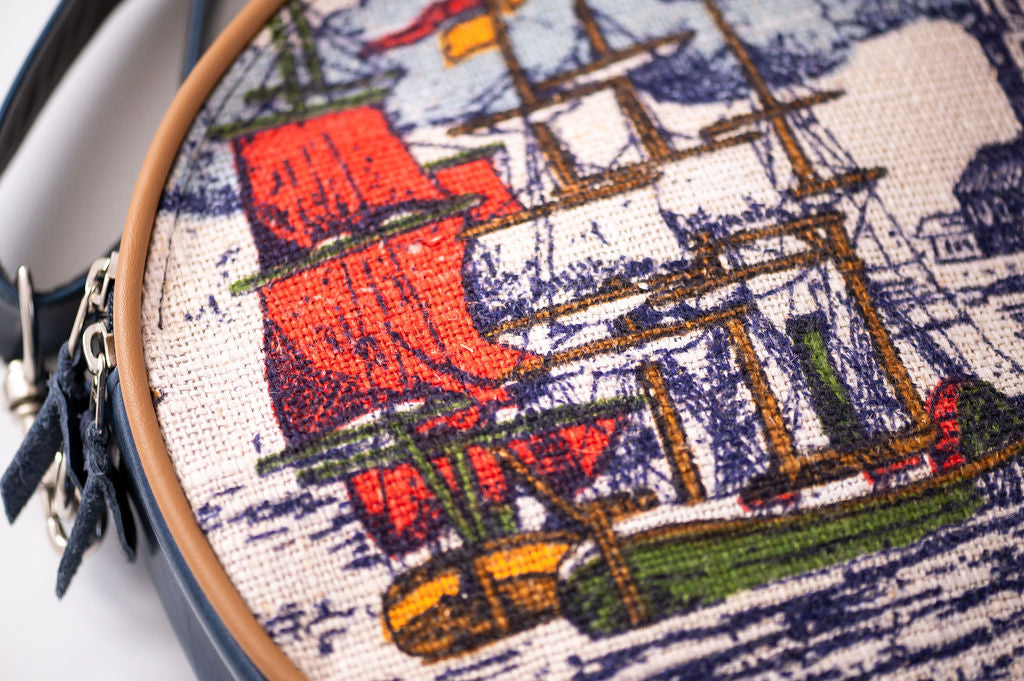 circle round bag with a colorful ship design on a white background#color_nautical-sailboat-barkcloth