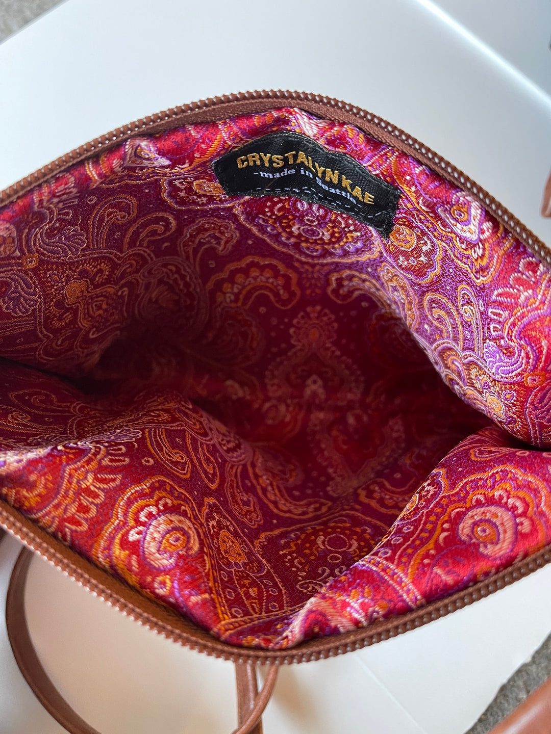 Bossa Nova Medium Crossbody Bag from Glazed Vegan Leather made in USA#color_ale-brown