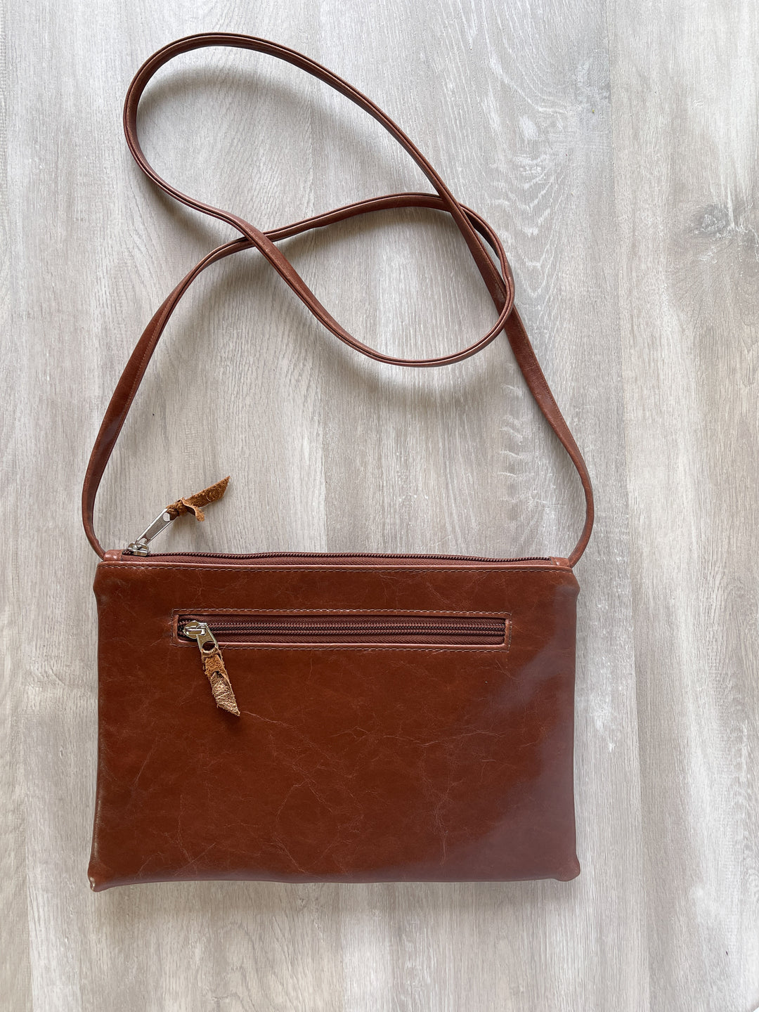 Bossa Nova Medium Crossbody Bag from Leather made in USA#color_grey-gardens-three