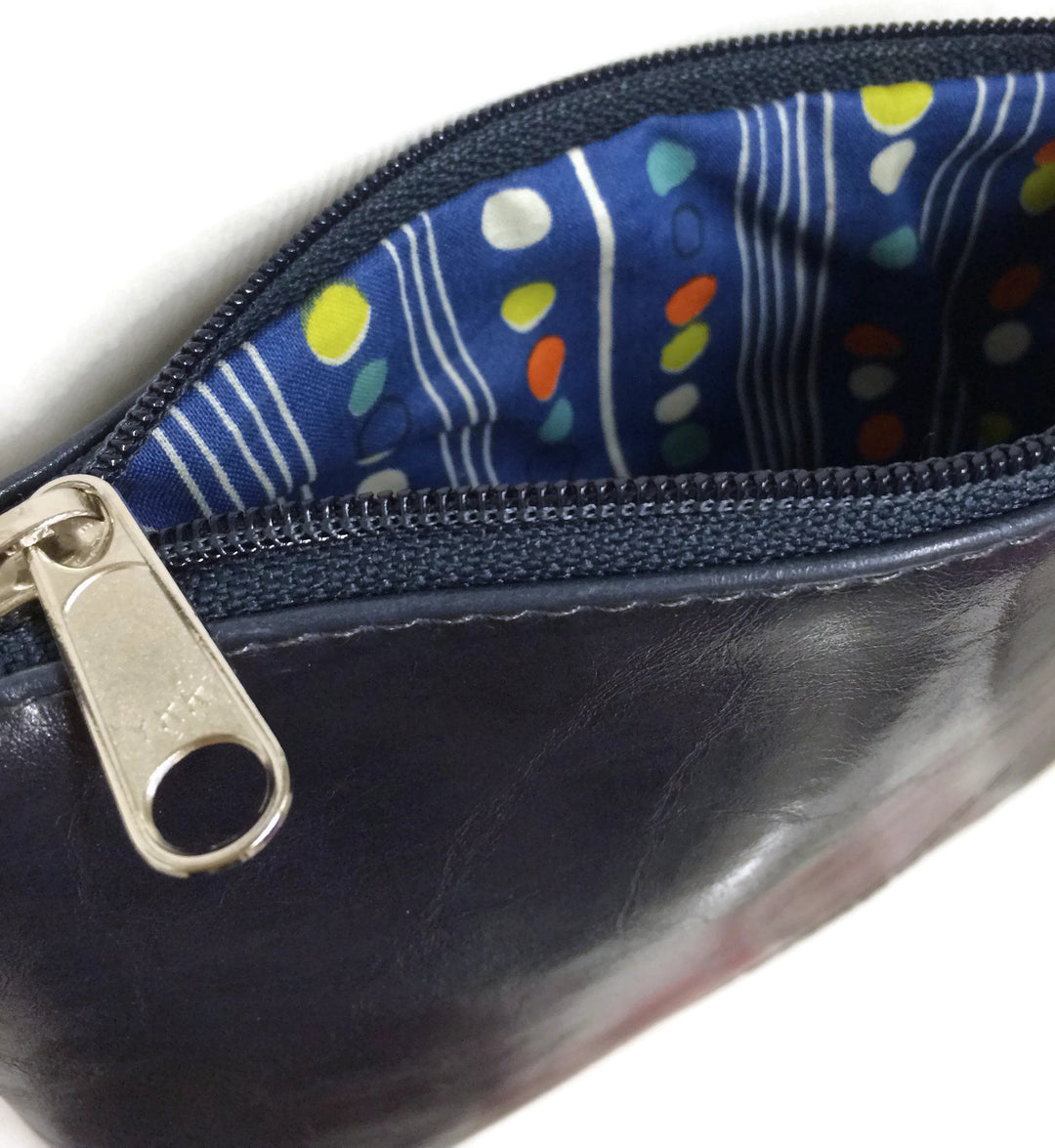 close up of vintage fabric printed lining Cha Cha Small Crossbody Bag - Navy Vegan Leather