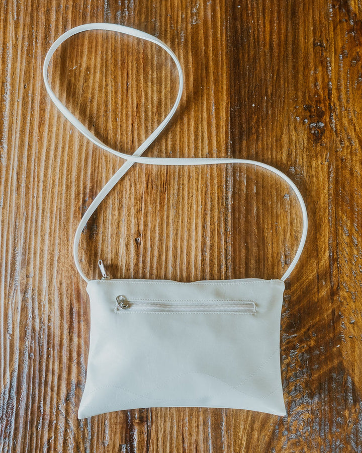 Bossa Nova Medium Crossbody Bag from Glazed Vegan Leather made in USA#color_warm-white